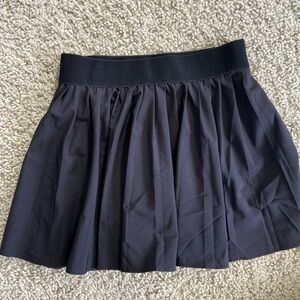 Garage black pleated mini skirt. Very black just photo lighter. Size P / S